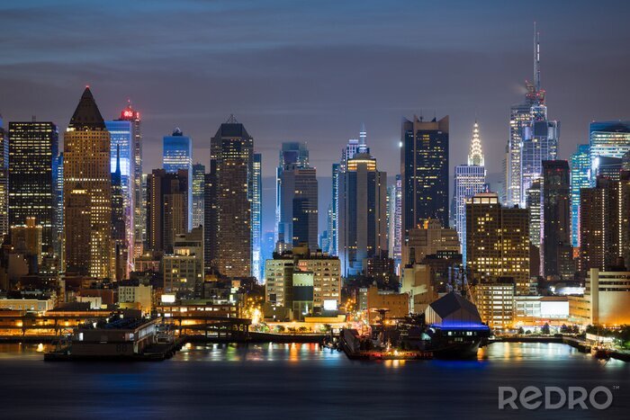 Fotobehang De gebouwen van New York bij nacht