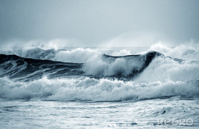Fotobehang De schuimende golven van de oceaan