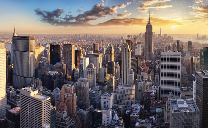 Fotobehang De skyline van New York City bij zonsondergang