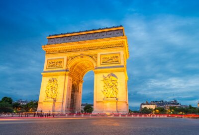 Fotobehang De verlichte Arc de Triomphe in Parijs