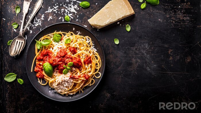 Fotobehang delicious appetizing classic spaghetti pasta with tomato sauce, parmesan
