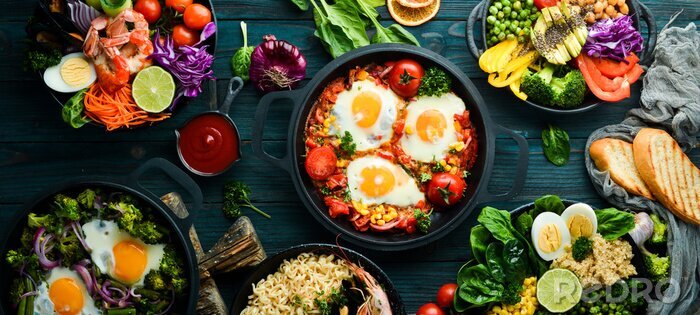 Fotobehang Dishes background. Set of dishes on the dining table. Food. Traditional cuisines of the world. Top view. Free space for your text.