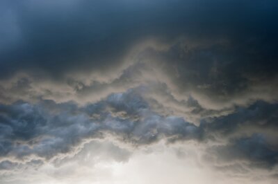 Fotobehang Donkere en lichte wolken