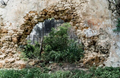 Fotobehang Een gat in de oude muur