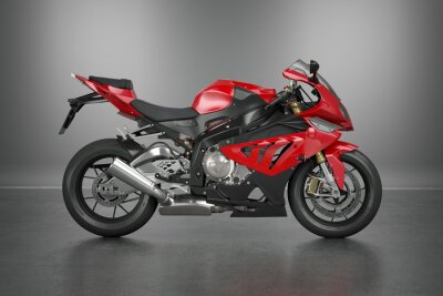Een krachtige motorfiets met rode accenten op een grijze achtergrond