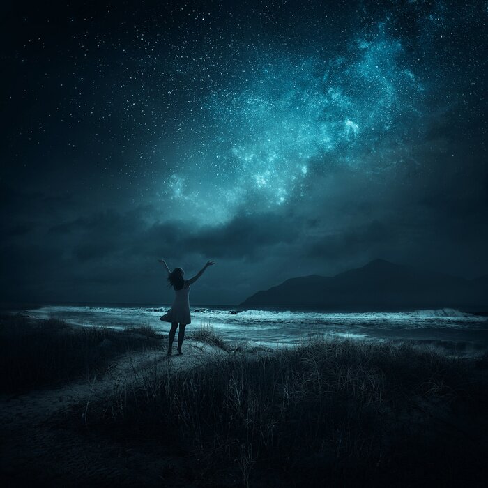 Fotobehang Een meisje tegen de sterrenhemel