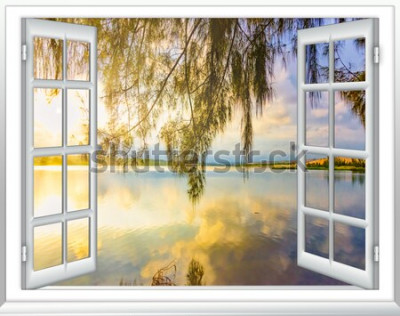 Fotobehang Een paradijselijk uitzicht op de oceaan vanuit het eilandraam op een zonnige zomerdag