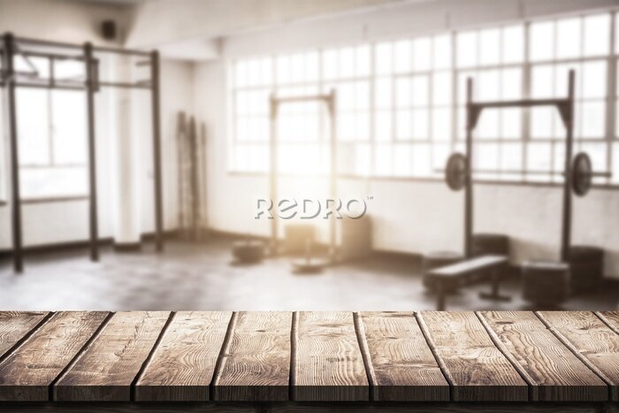 Fotobehang Een stijlvolle sportschool met gewichten in vintage-stijl