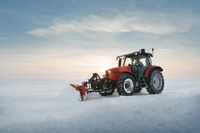 Fotobehang Een tractor met een sneeuwruimer