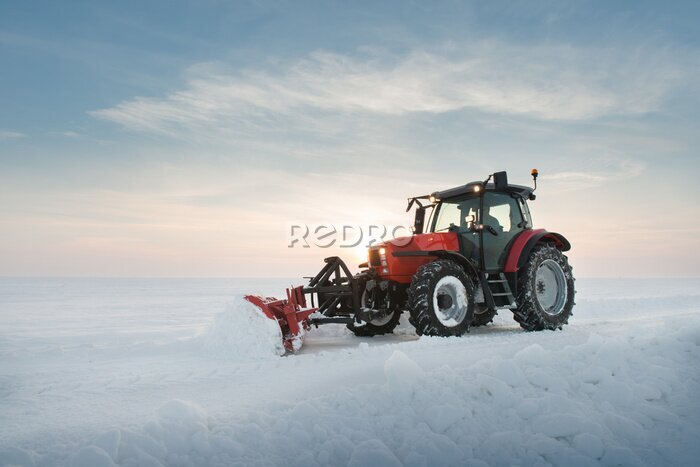 Fotobehang Een tractor met een sneeuwruimer
