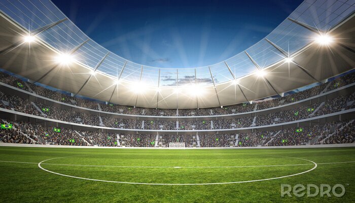 Fotobehang Een voetbalveld verlicht door schijnwerpers