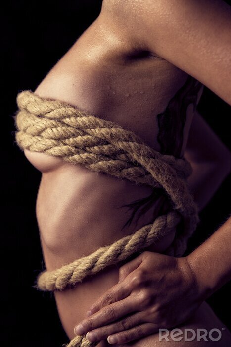 Fotobehang Erotische vrouw vastgebonden met touw