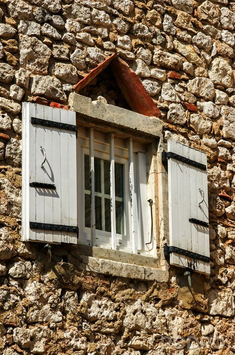 Fotobehang Fenêtre avec barreaux de protection