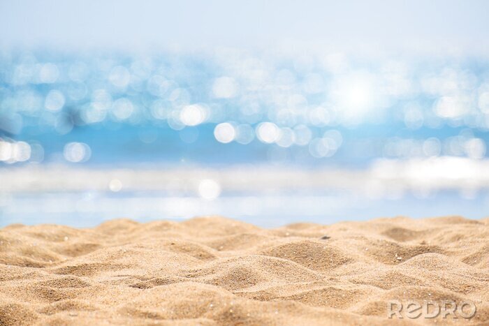 Fotobehang Focus op het zand op het strand