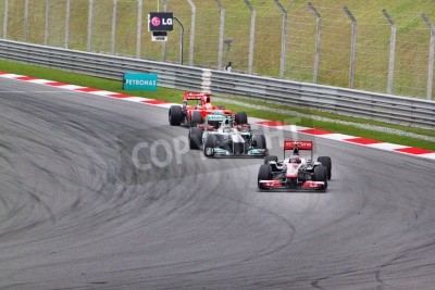 Fotobehang Formule 1-auto in een bocht