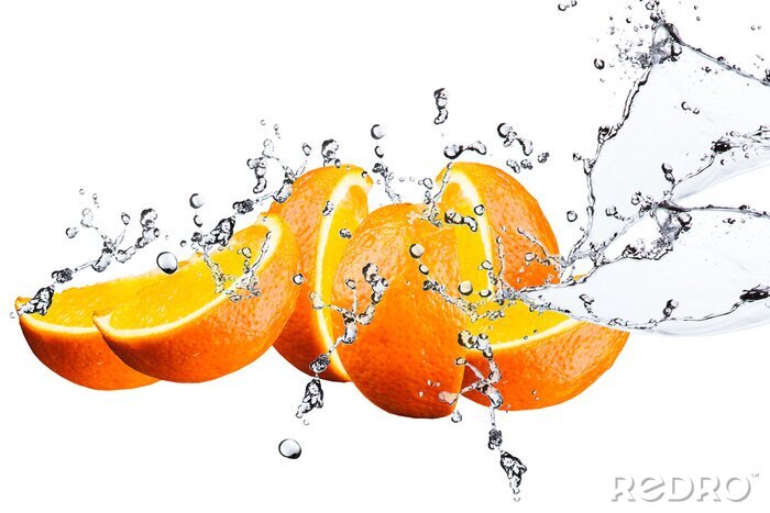 Fotobehang Gesneden sinaasappels in water
