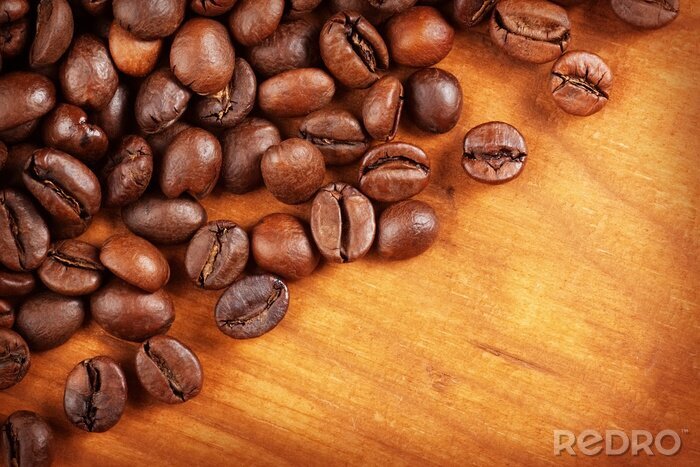 Fotobehang Gestrooide koffie op hout
