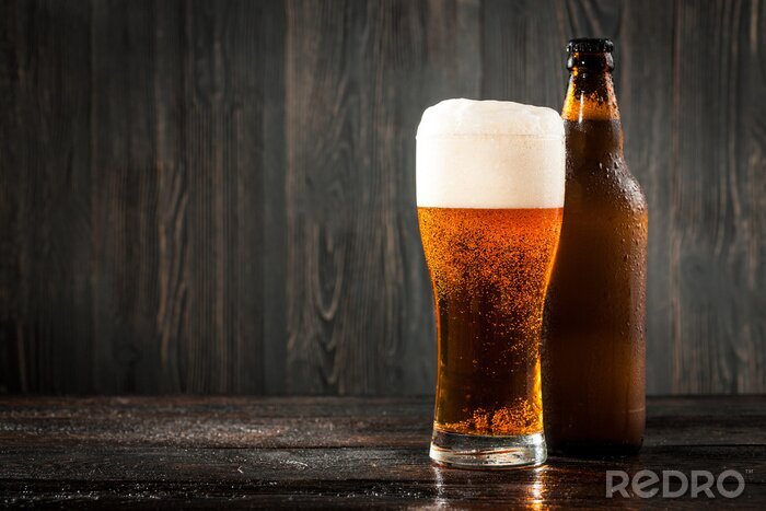 Fotobehang Glas bier en bierfles