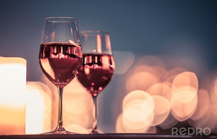 Fotobehang Glazen wijn en kaarslicht