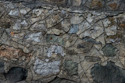 Grijs gekleurde steen aan een muur