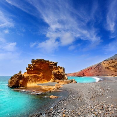 Fotobehang Grijs strand en turquoise zee