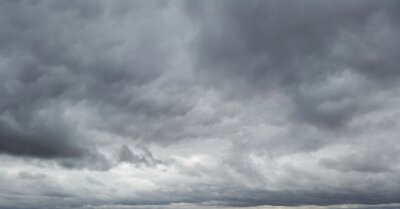 Fotobehang Grijs-witte wolken