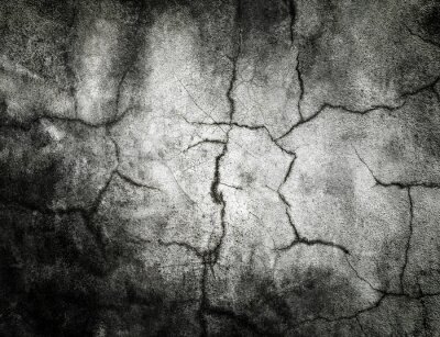 Fotobehang Grijs-zwarte muur met scheuren
