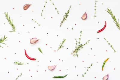 Fotobehang Groene kruiden, pepers en specerijen op een witte achtergrond