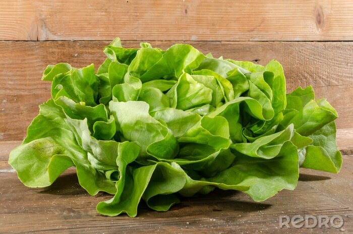 Fotobehang Groene salade op tafel