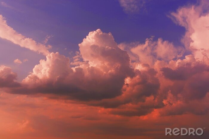 Fotobehang Grote wolken bij zonsondergang