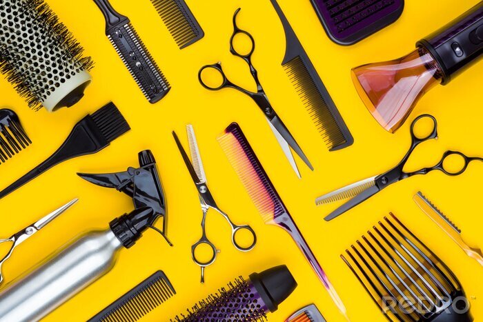 Fotobehang Hairdresser tools and combs tools on yellow background, top view