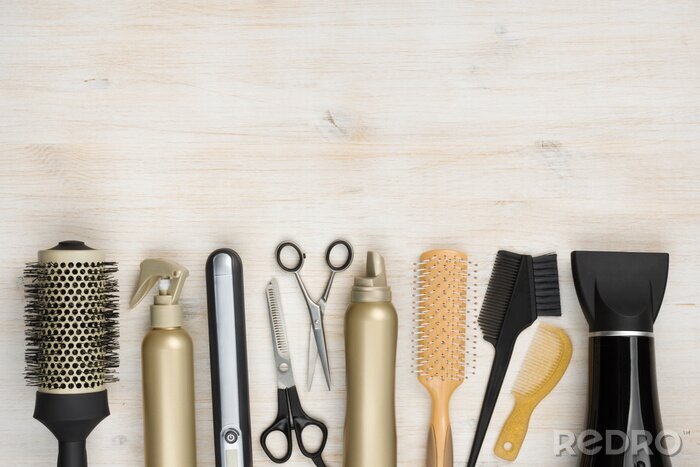 Fotobehang Hairdressing tools on wooden background with copy space at top