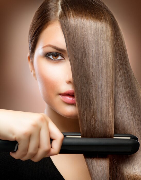 Fotobehang Hairstyling.Hairdressing.Hair Straightening Irons.Straight Hair