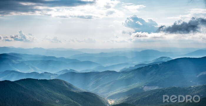 Fotobehang Helderblauwe ochtend boven de bergen