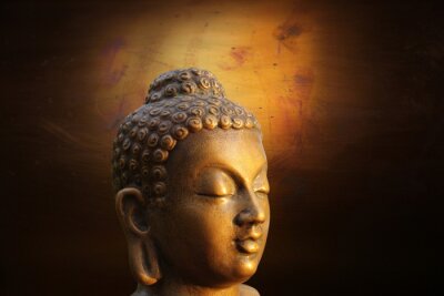 Hoofd van Budha op gouden achtergrond