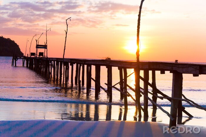 Fotobehang Houten pier bij avondlicht