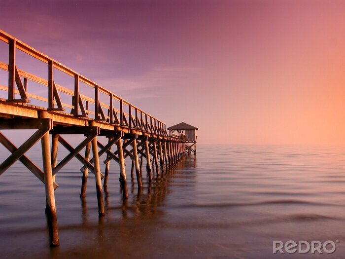Fotobehang Houten pier bij de zee