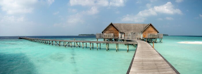 Fotobehang Huisje aan een tropische zee