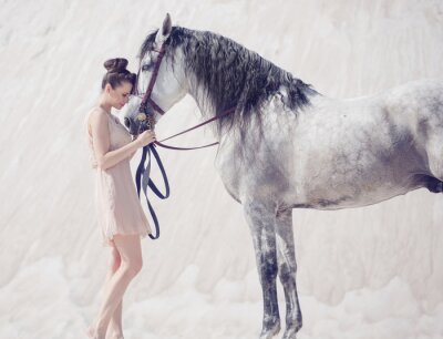 Fotobehang Jonge vrouw met een paard