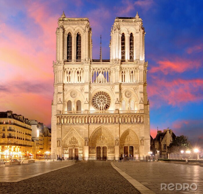 Fotobehang Kleurrijke lucht boven de kathedraal van Notre Dame