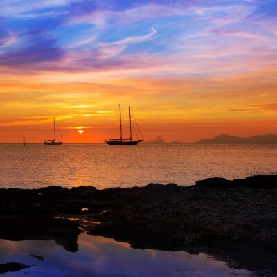 Fotobehang Kleurrijke zonsondergang over de zee