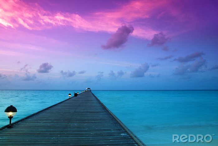 Fotobehang Landschap met zonsondergang op de Malediven