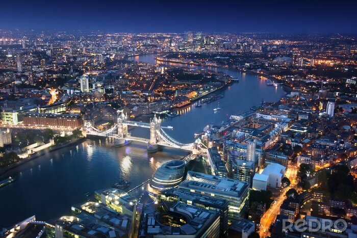 Fotobehang Londen bij nacht met stedelijke architectuur en de Tower Bridge