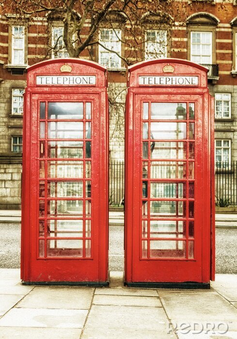 Fotobehang Londense telefooncellen voor toeristen