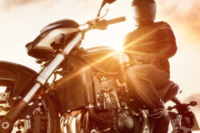 Fotobehang Motorrijder op zijn motor