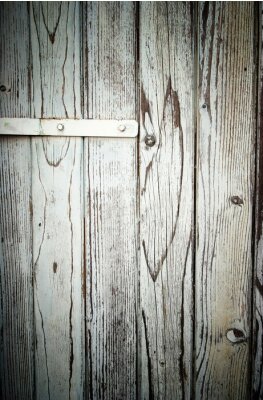 Fotobehang Muur met een houten poort