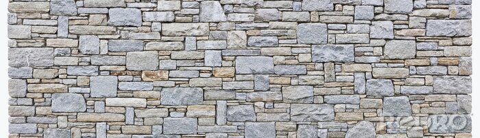 Fotobehang Muur met stenen van verschillende grootte