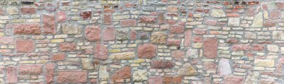 Fotobehang Muur met verschillende stenen