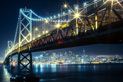 Fotobehang Nachtelijke skyline van San Francisco met de Bay Bridge