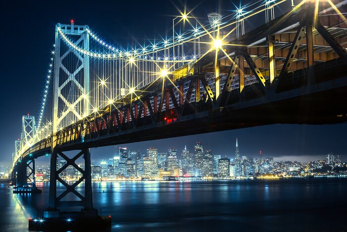 Fotobehang Nachtelijke skyline van San Francisco met de Bay Bridge